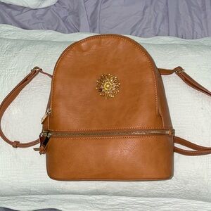 Brown leather mini backpack